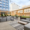 The Hamilton outdoor space with lounge seating and tables