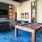 Game room with a pool table and TV